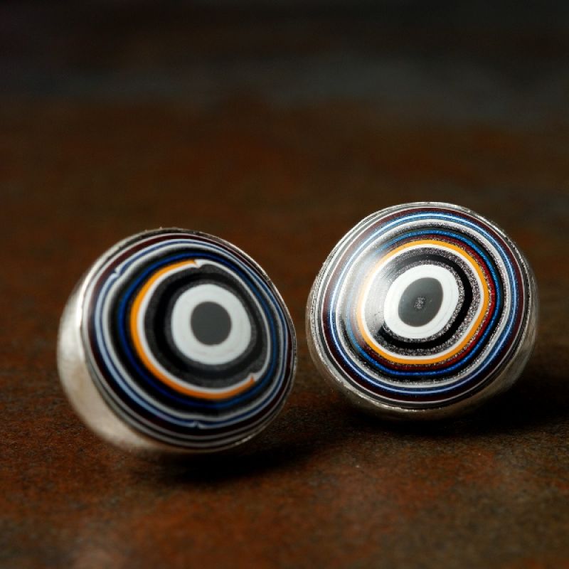 A pair of one of a kind handcrafted recycled sterling silver round studs with vibrant Fordite, Detroit Agate, perfect for those who are after a youthful look in their jewellery
